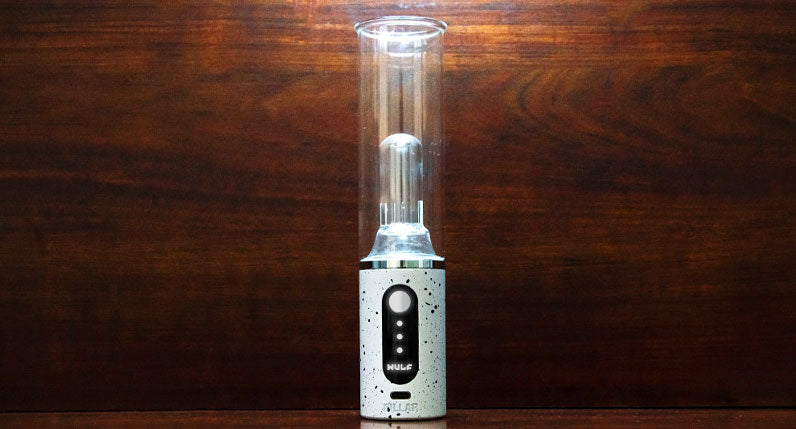 Wulf Pillar standing in front of wooden desk